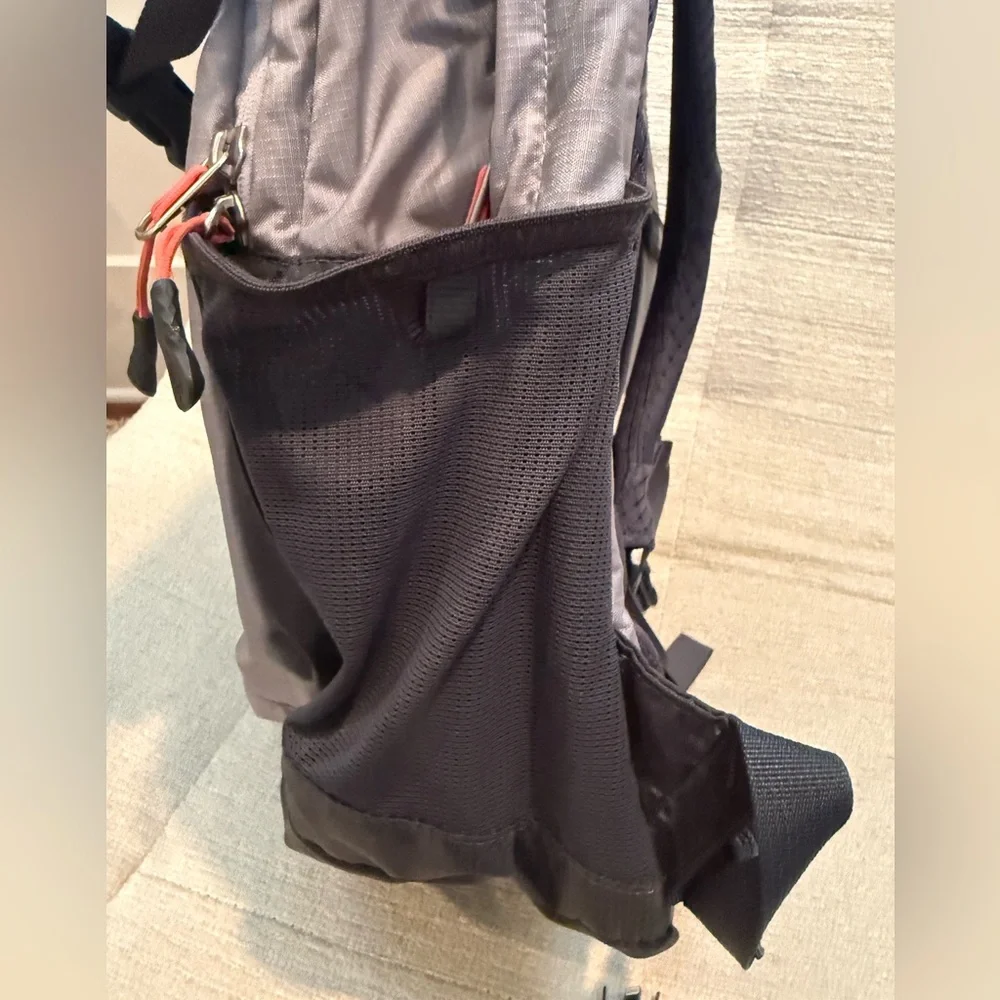 The North Face Gray and Black Backpack with Orange Logo